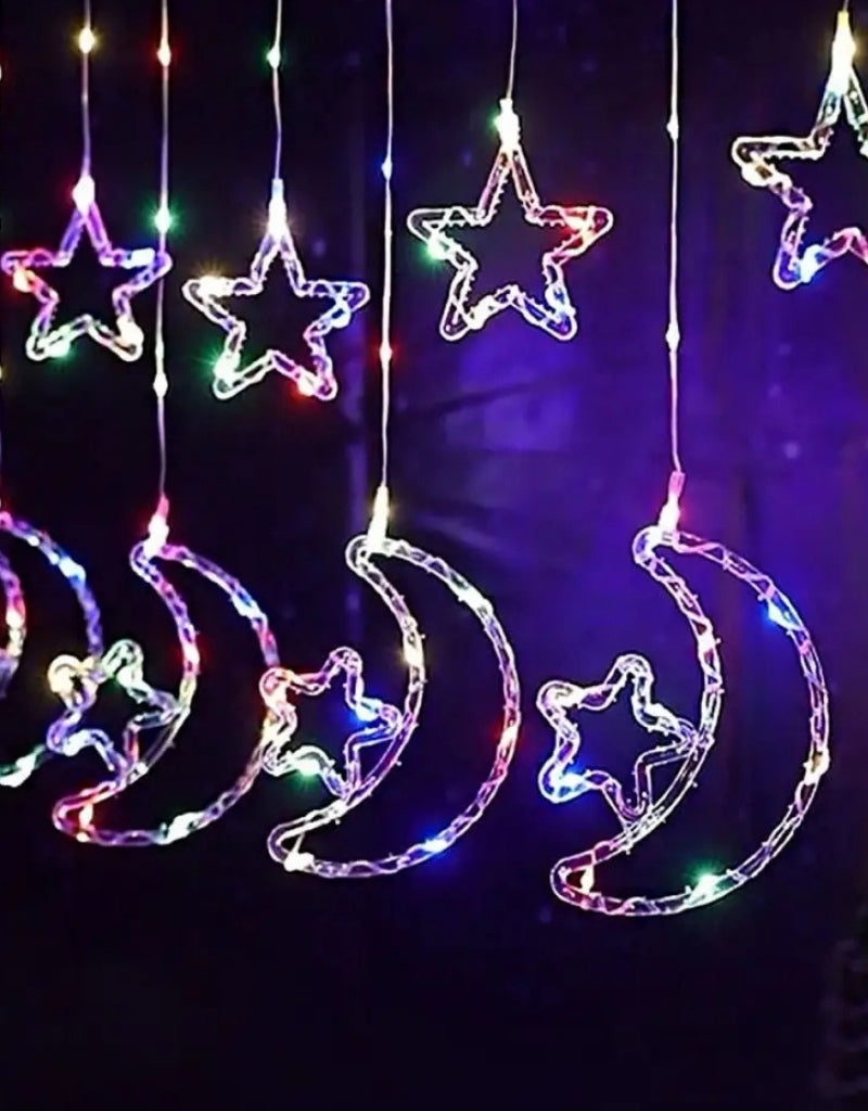 LED light decoration in the shape of a moon and star