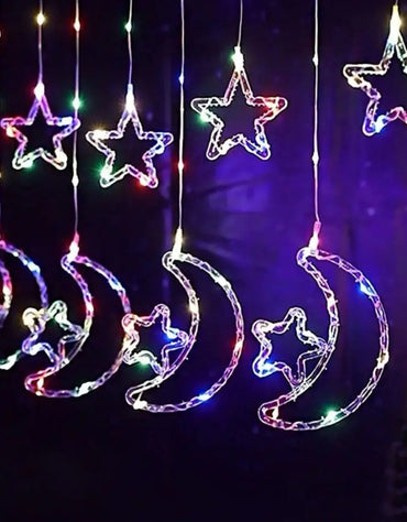 LED light decoration in the shape of a moon and star