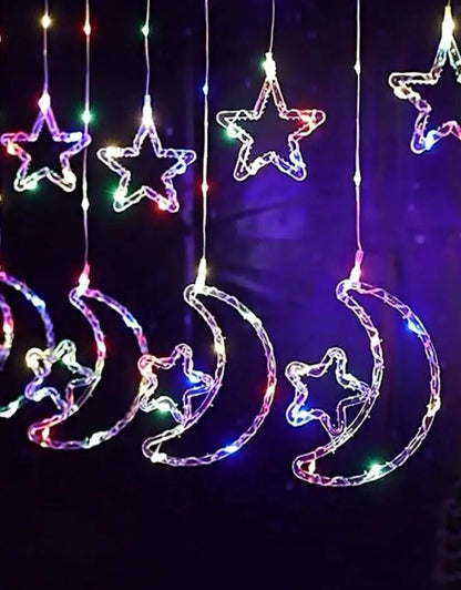 LED light decoration in the shape of a moon and star