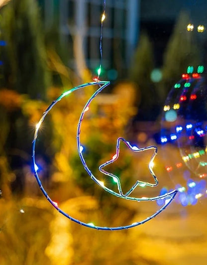 LED light decoration in the shape of a moon and star