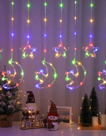 LED light decoration in the shape of a moon and star