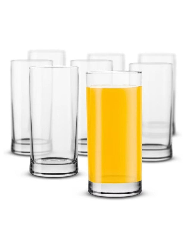 Set of clear glasses with one filled with orange juice on a white background.
