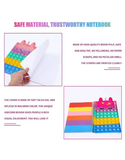Details of unicorn popit notebook with colorful cover, soft silicone, and lined pages for writing and notes.