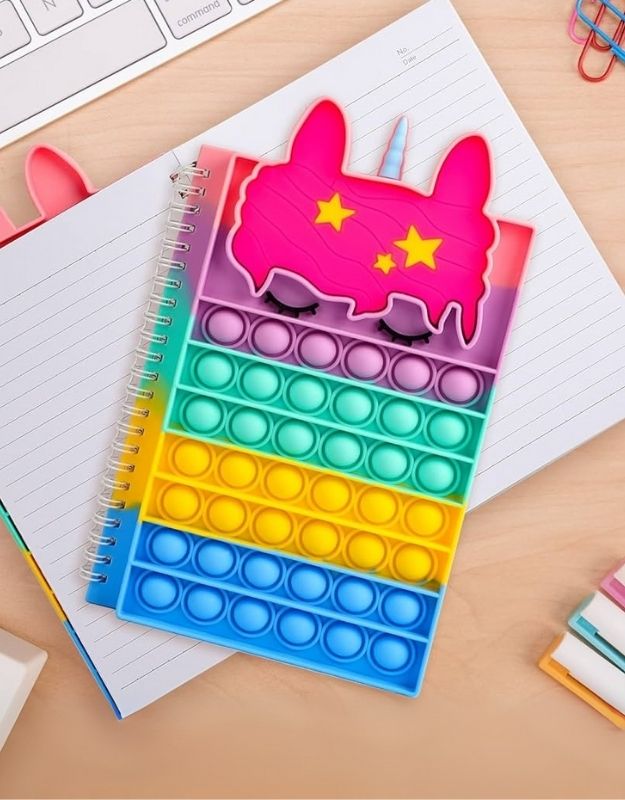 A5 unicorn popit silicone notebook with rainbow bubble cover, perfect for school or journaling fun.