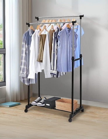 Adjustable clothing rack with double rails and storage shelf for shoes and boxes.