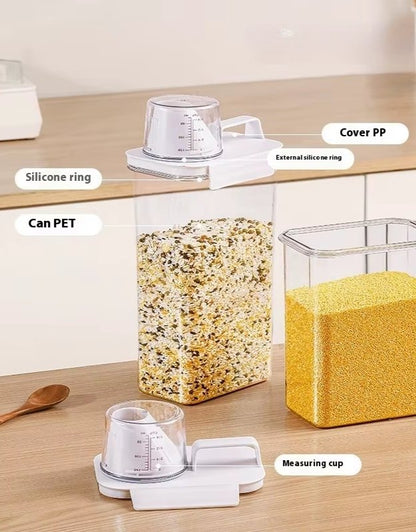 Containers with popcorn and measuring cups on a wooden surface. Food storage container showing parts including silicone ring, PET can body, cover, and measuring cup.