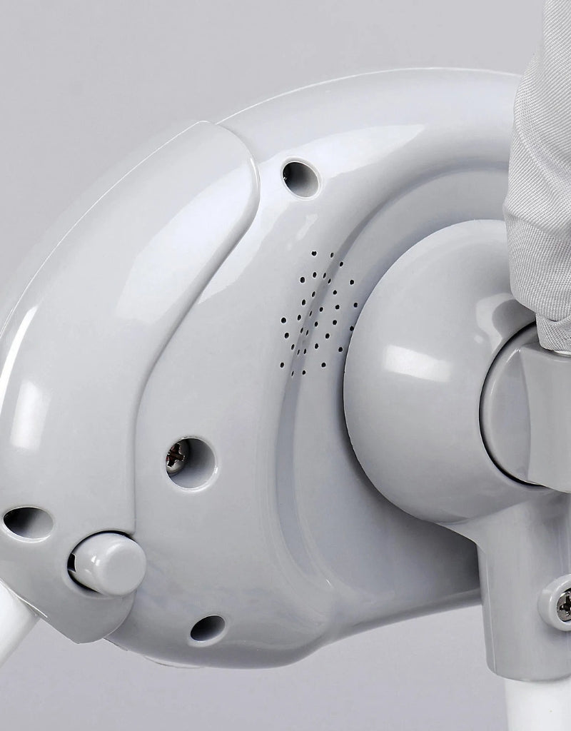 Close-up of the sound and vibration control unit on the baby rocking chair.