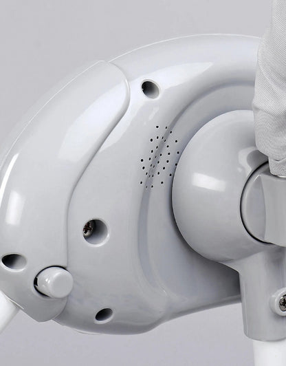 Close-up of the sound and vibration control unit on the baby rocking chair.