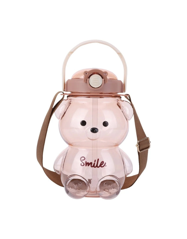 Light brown bear-shaped water bottle with brown strap and brown lid. The word "Smile" is written on the front in brown text.