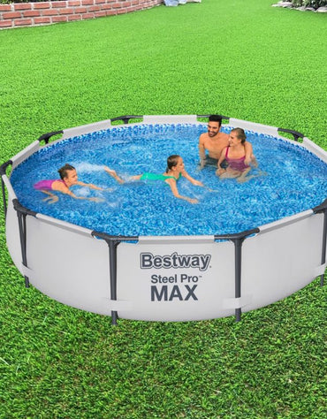 Family of four enjoying swimming in Bestway Steel Pro MAX 305x76cm above ground pool placed on green grass