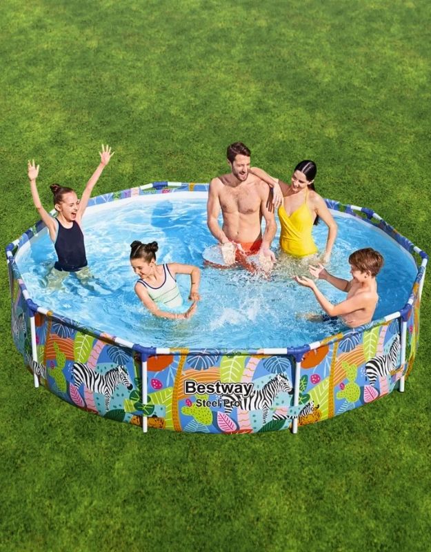 Family enjoying in Bestway Steel Pro Jungle 305x66cm round above-ground pool with colorful jungle design.