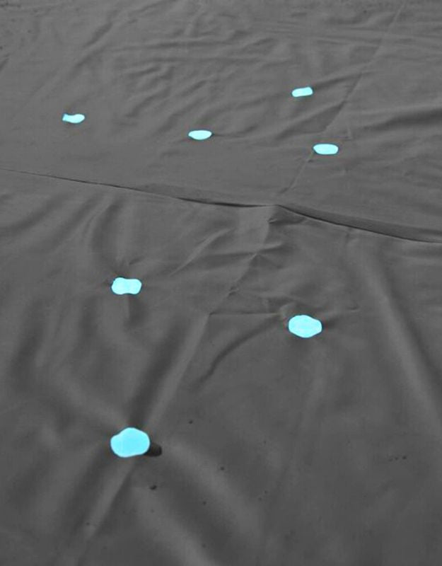 Close-up of Bestway Flowclear pool cover drain holes to prevent water accumulation