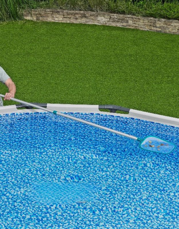 Bestway pool skimmer net being used to clean a swimming pool.