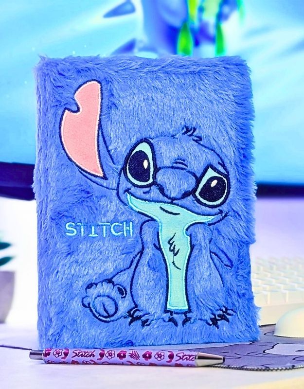 Blue plush notebook with Stitch design on a blurred background