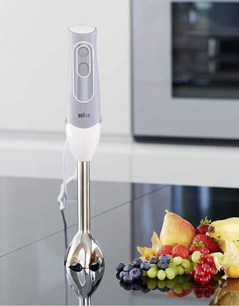 Braun MultiQuick 5 Hand Blender standing on counter beside fresh fruits