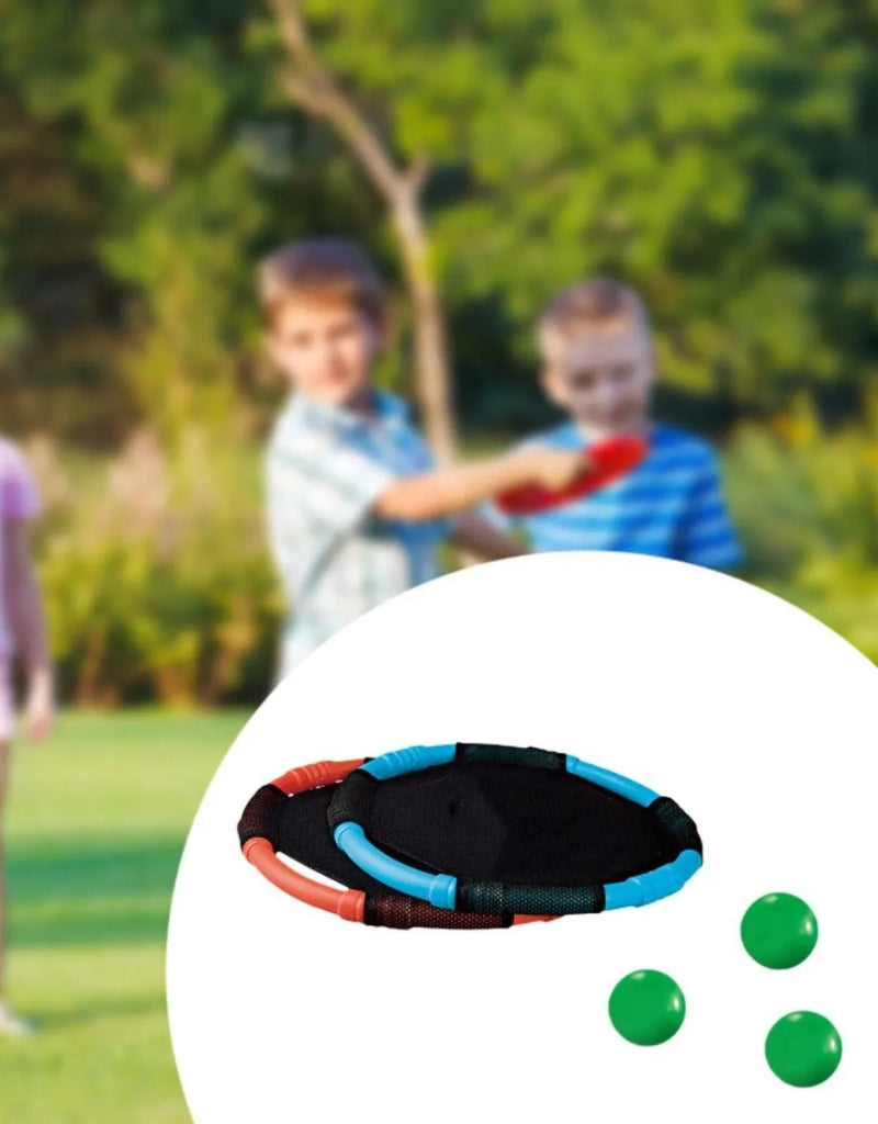 Two portable Catch Balls Game paddles (red/orange and blue) with four green balls for beach or outdoor play.