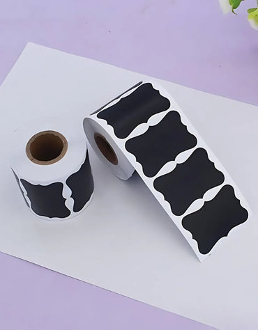 Two rolls of black adhesive chalkboard labels for spice jars and pantry organization