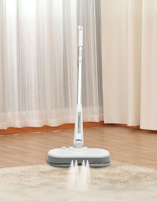 A white cordless electric mop with LED light being used on a wooden floor, displaying its cleaning function.