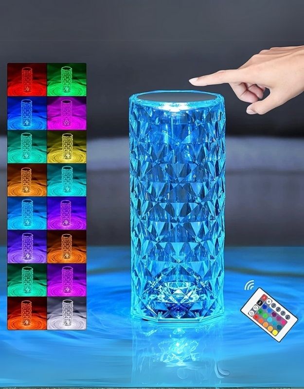 A colorful RGB crystal lamp with a diamond design being operated by a touch control, shown with a remote control and various color options.