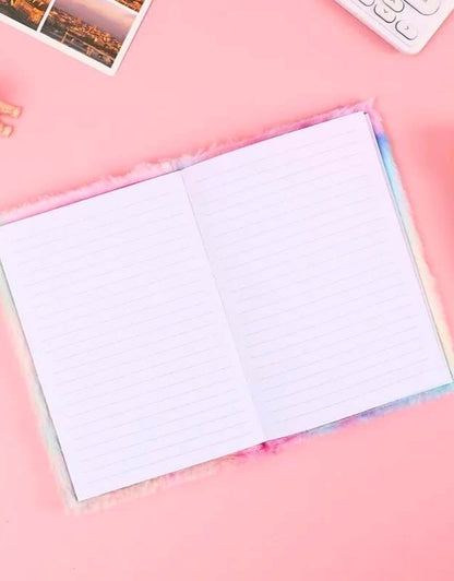 Open unicorn diary notebook with lined pages for writing