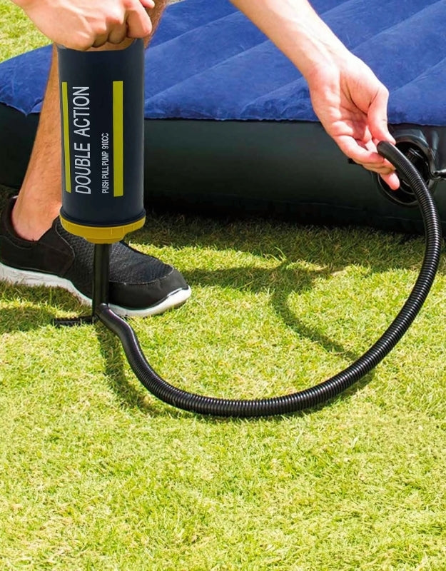 Double Action SY-H8014 air pump being used to inflate an air mattress outdoors