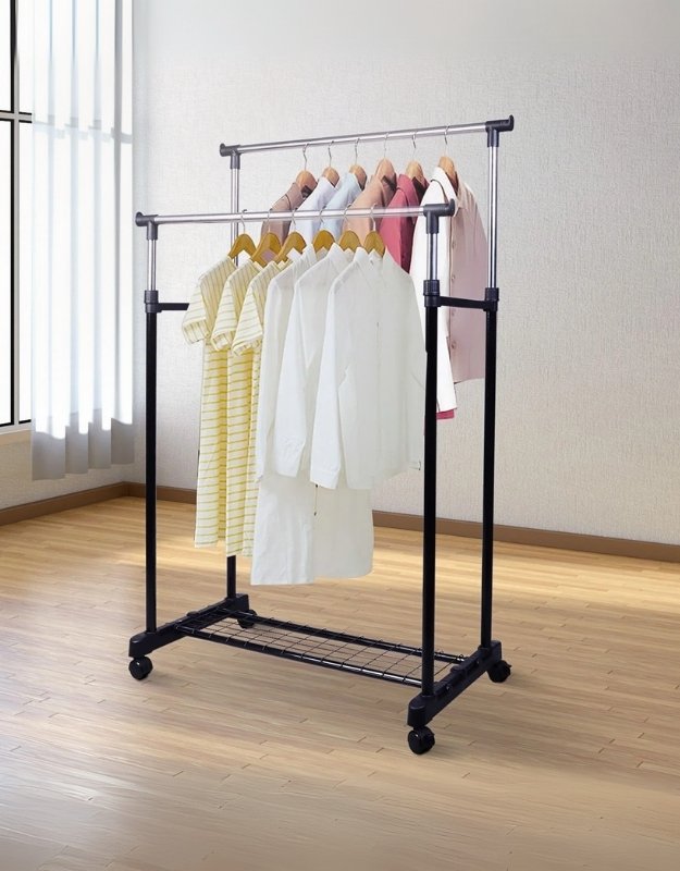 A black stainless steel portable clothing hanger with double pole, featuring two layers of hanging space with clothes rails, mounted on wheels and standing in an indoor setting.