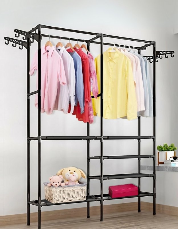 Double rod metal clothes rack with shelves for wardrobe storage and hanging shirts.