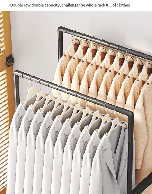 Clothing rack with double row capacity holding white and beige shirts. Double row clothes rack showing large capacity with two levels of hanging space.