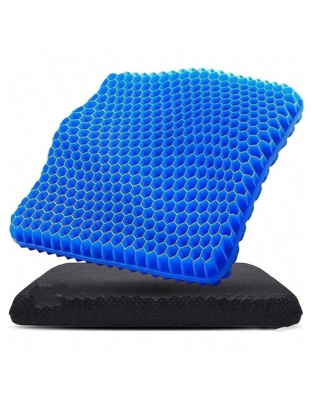 A blue honeycomb design wheelchair cushion chair pad with a black non-slip base.