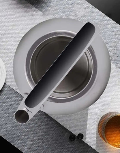 Top view of DSP electric stainless steel kettle with open lid, showing wide opening for easy filling and cleaning