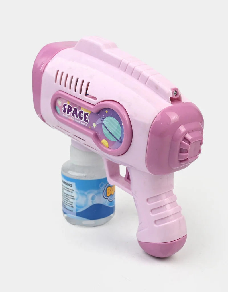 Side angle view of pink electric bubble machine shooting gun toy with bubble water bottle