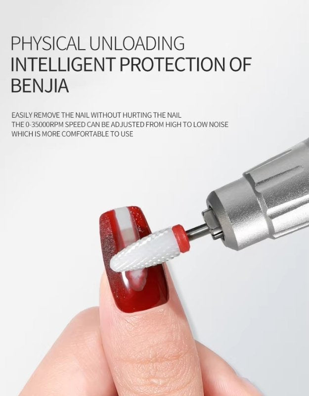 Electric nail drill filing artificial nails with protective design.