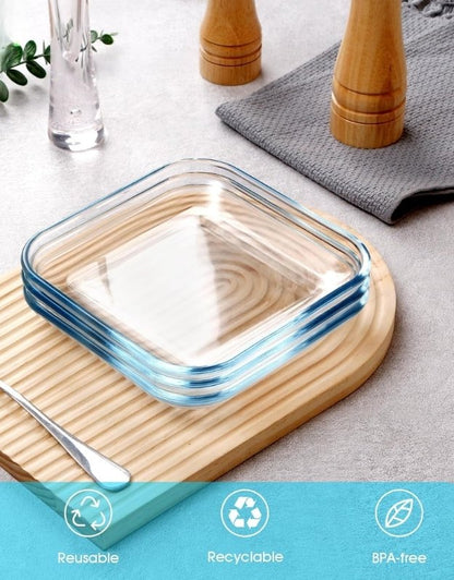 BPA-free, reusable, recyclable glass salad plates stacked on a wooden tray.

