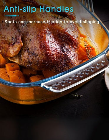 Oven safe glass baking dish with anti-slip handles holding roasted meat and vegetables
