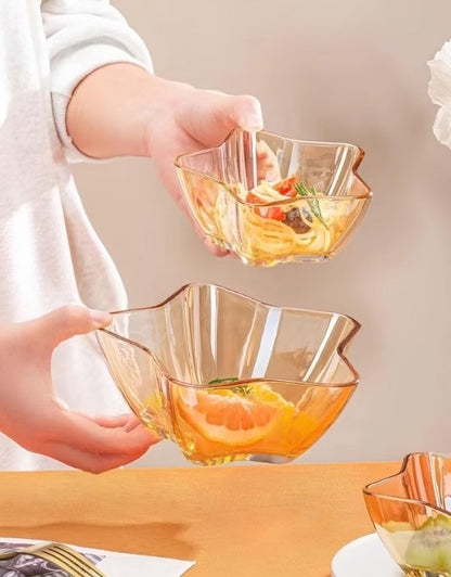 Person holding star-shaped glass bowls filled with salad and fruit from the 7 pcs pentagram dessert bowl set.