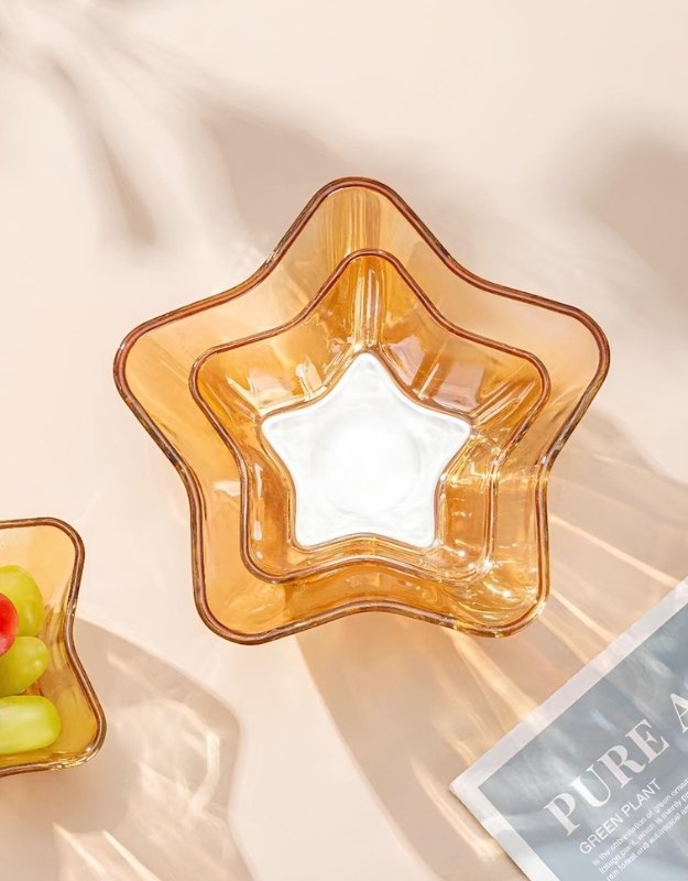 Nested star-shaped amber glass bowls in different sizes from the 7 pcs fruit salad bowl set.