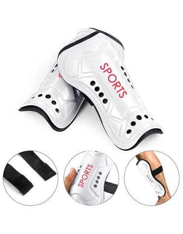 Protective football shin pads with adjustable elastic straps.