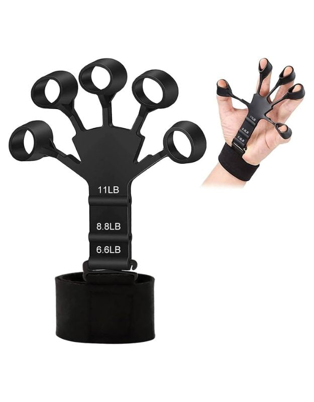 A black silicone grip strength trainer with six finger holes, each marked with resistance levels ranging from 6kg to 11kg. The trainer is shown both as a standalone unit and being used on a person's hand.