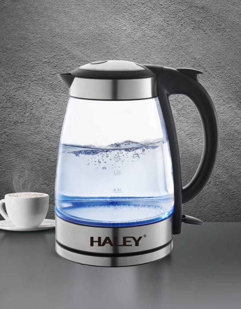 Haley High Quality 2.2L Electric Kettle placed on kitchen counter beside a cup of hot coffee, stainless steel and glass design