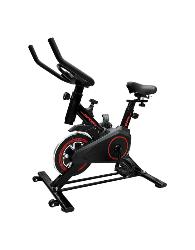Black indoor heavy-duty adjustable silent exercise bike with red accents, side view on white background.