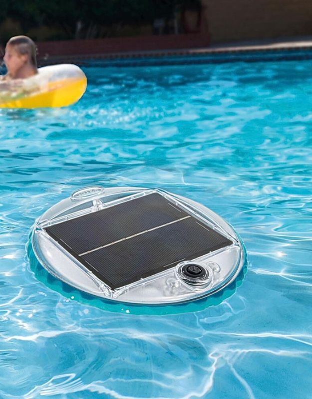 Intex 28695 solar powered floating lantern on water surface in daytime