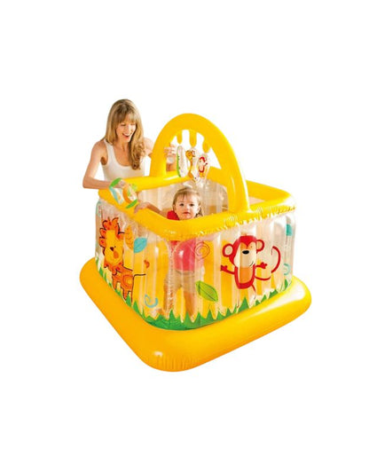 Baby playing inside Intex 48473NP Soft Sides Lil Baby Gym Play Centre with mother supervising