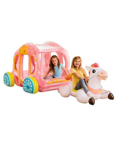 Two girls playing indoors with Intex 56514NP inflatable stroller carriage and unicorn float.
