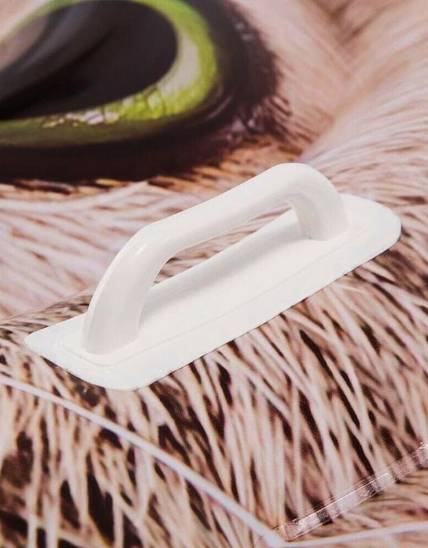 Durable white handle on the Intex 58784EU hyperrealistic cat face inflatable mat for easy carrying and stability.