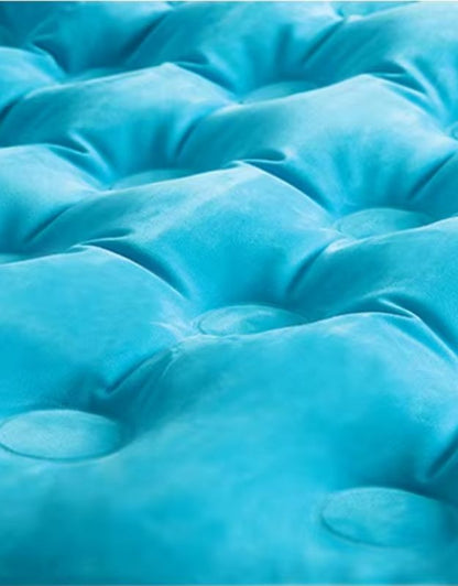Closeup of soft flocked surface of Intex inflatable lounge chair in blue.