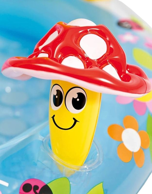  Close-up of the happy mushroom character on the baby pool.