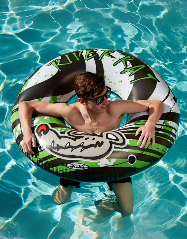 Teenager relaxing in Intex River Rat inflatable floating pool tube 122cm