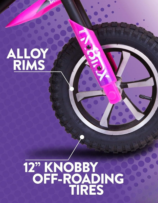 Close-up of alloy rims and 12-inch knobby off-road tires on Motrax pink dirt bike