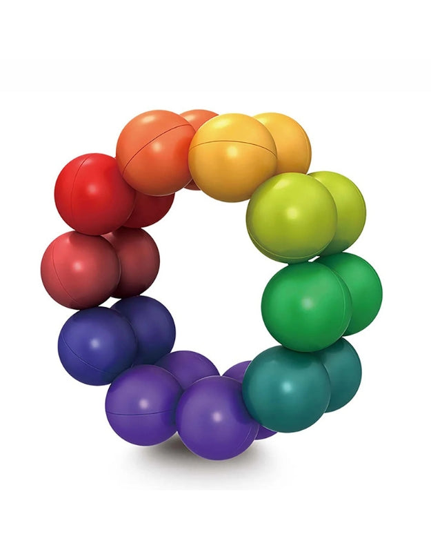 An overhead shot of all the components from the magnetic ball set, including numerous colorful balls and sticks, arranged on a white background.