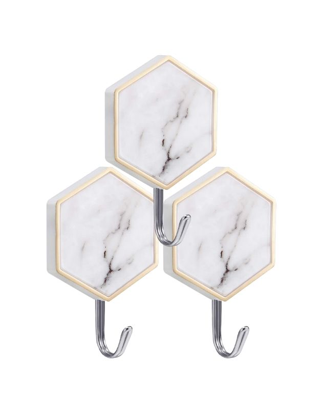 Hexagon marble adhesive wall hook with stainless steel hook.